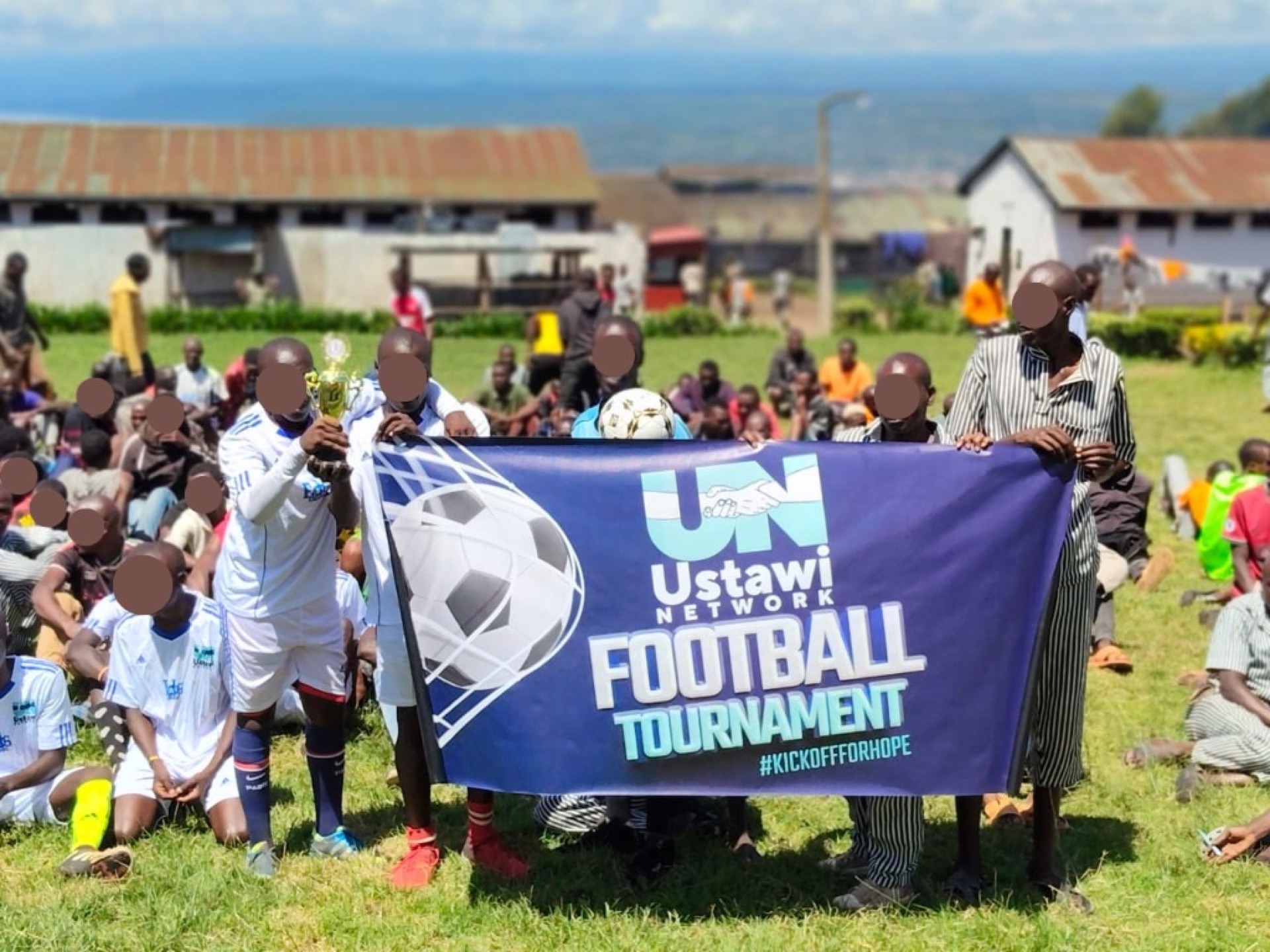 Ustawi Network football tournament launch with participants on the field.
