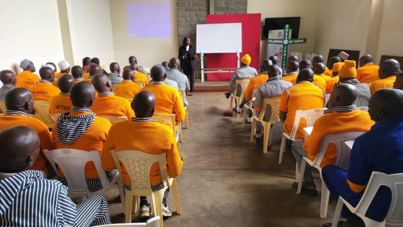 Kenya Prisons leadership engaging with participants through sport.