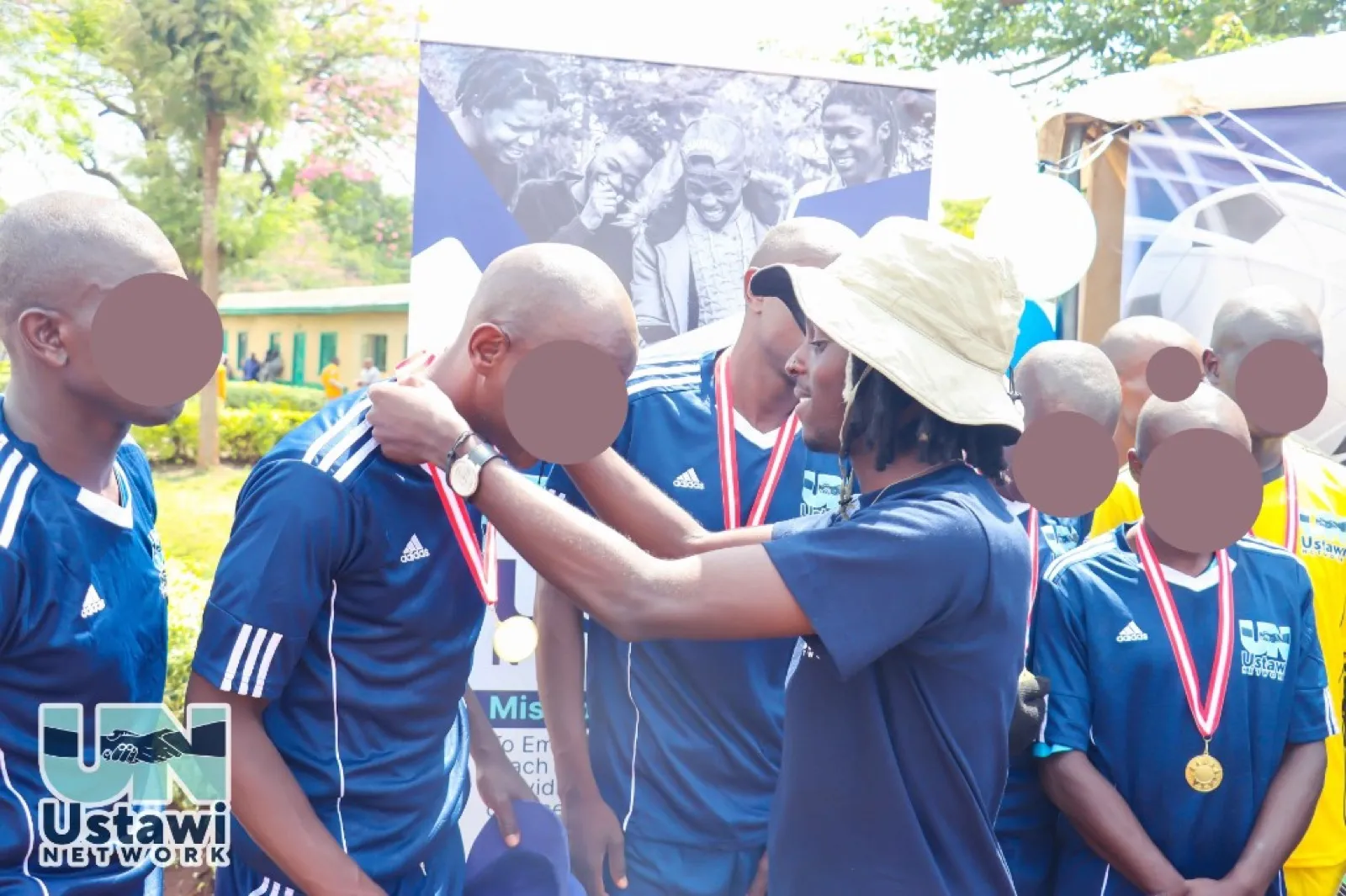 Medal awarding moment during Nakuru Main Prison tournament.